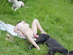 unforgettable sex with two dogs on the lawn